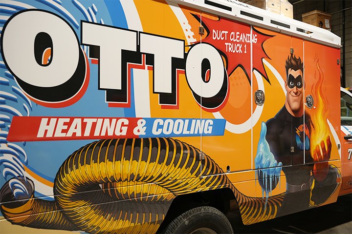 Otto Heating & Cooling service vehicle featuring branded graphics and duct cleaning equipment for residential HVAC services.