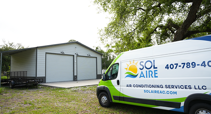 Sol Aire Air Conditioning Services LLC service van parked at a Florida job site for a Navien HVAC installation