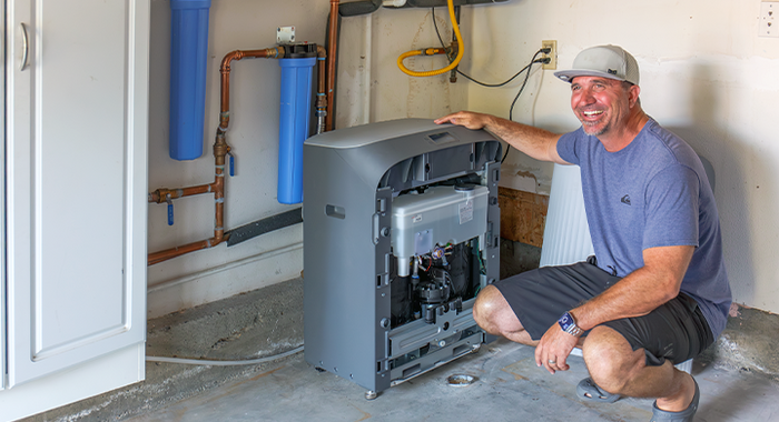 Navien WEC whole-home electric water treatment system installed in a residential home.