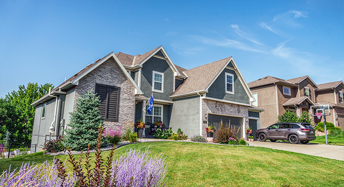 Exterior front view of the two-story suburban Kansas City home featured in the Navien HVAC case study